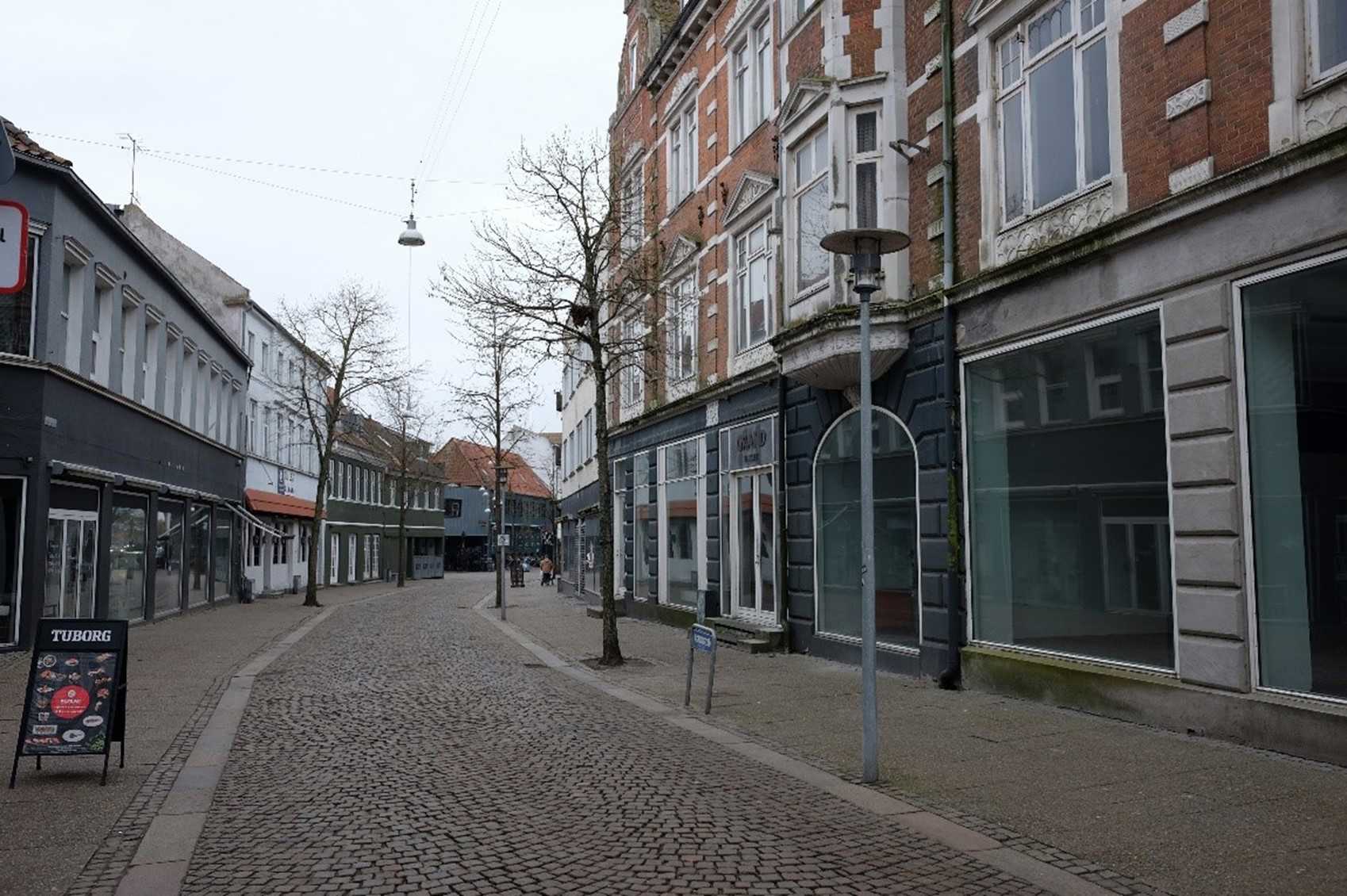 Middelgade med mange tomme lejemål